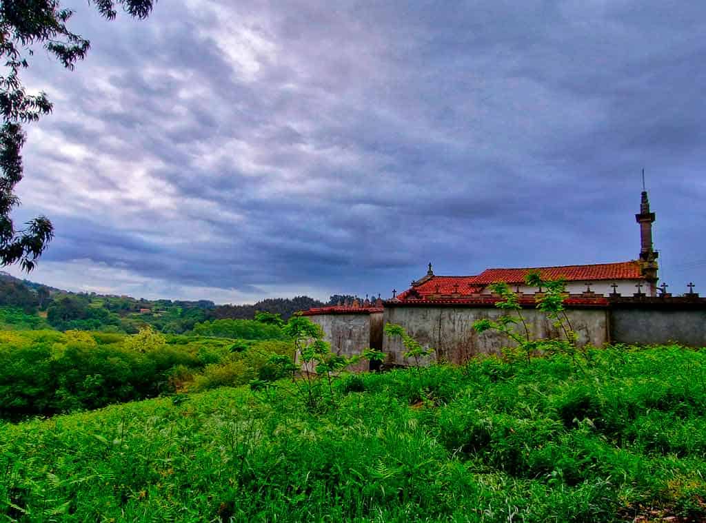dark skies over the church in Cos on the Camino Ingles