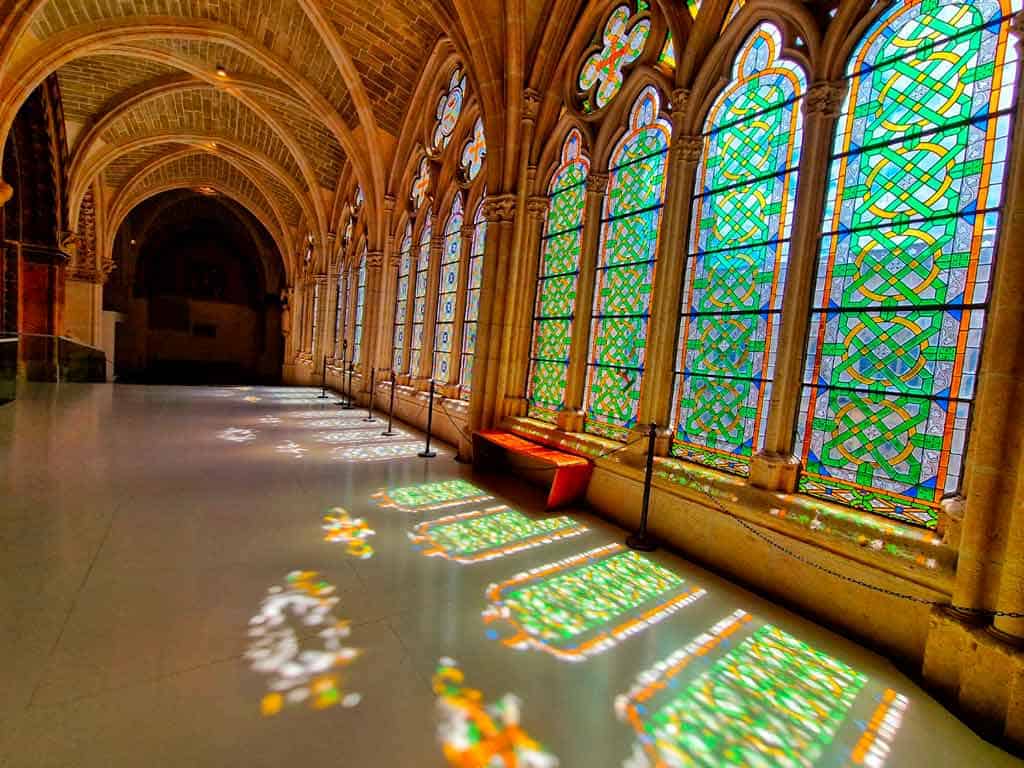 stain glass windows and reflections around the cloister of burgos cathedral