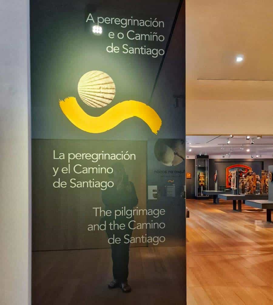 selfie... almost.  Colleen's reflection in the sign at the Pilgrim Museum in Santiago de Compostela