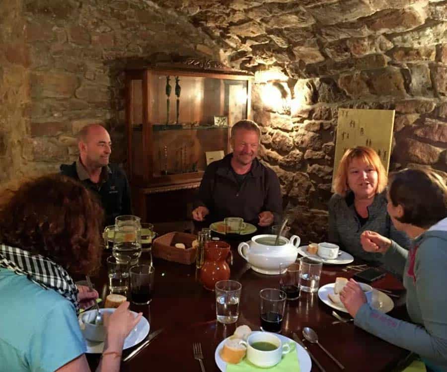 wonderful pilgrim meal - colleen and friends around the table