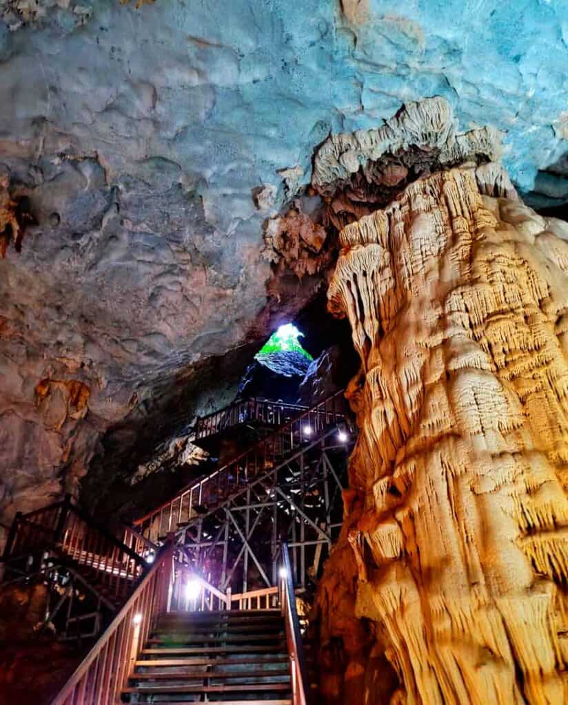 the wooden steps that lead to the entrance of Paradise Cave in Phong Nha
