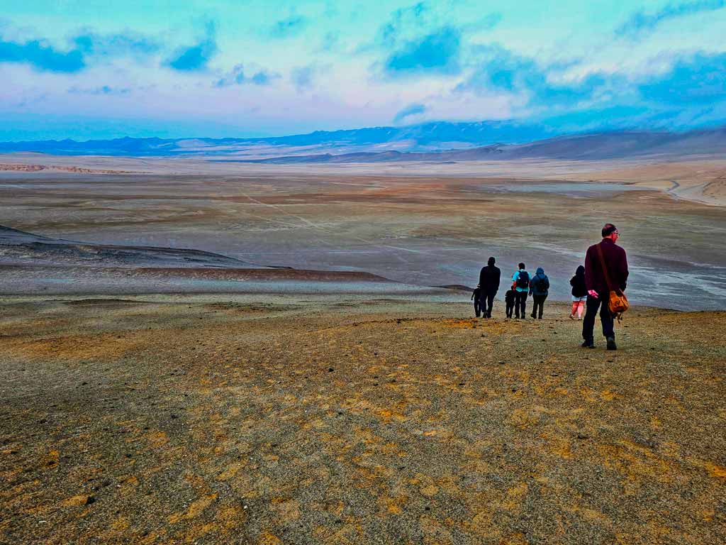 Gerry on the top of the dune about to make the descent down to the waiting bus