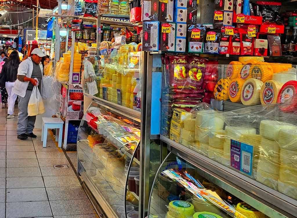 visit the local market for cheese and snacks