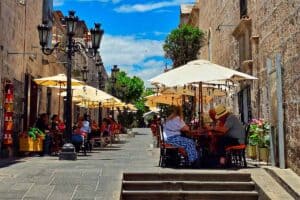 street with cafes and white parasols in the historic centre of Arequipa
