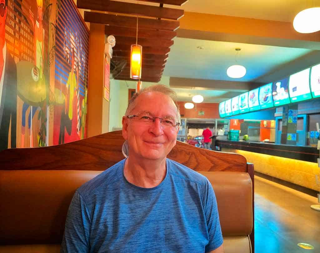 Gerry having a chicken supper in Nazca