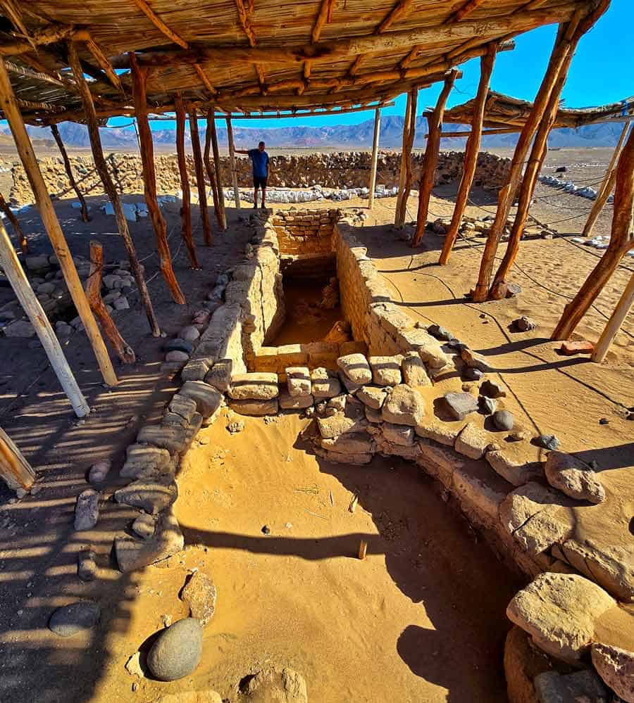 gerry beside one of the graves with three mummies in