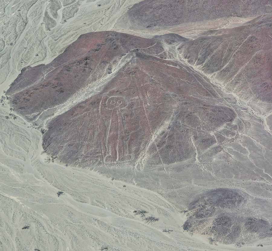 the space man etched on rocks at Nazca