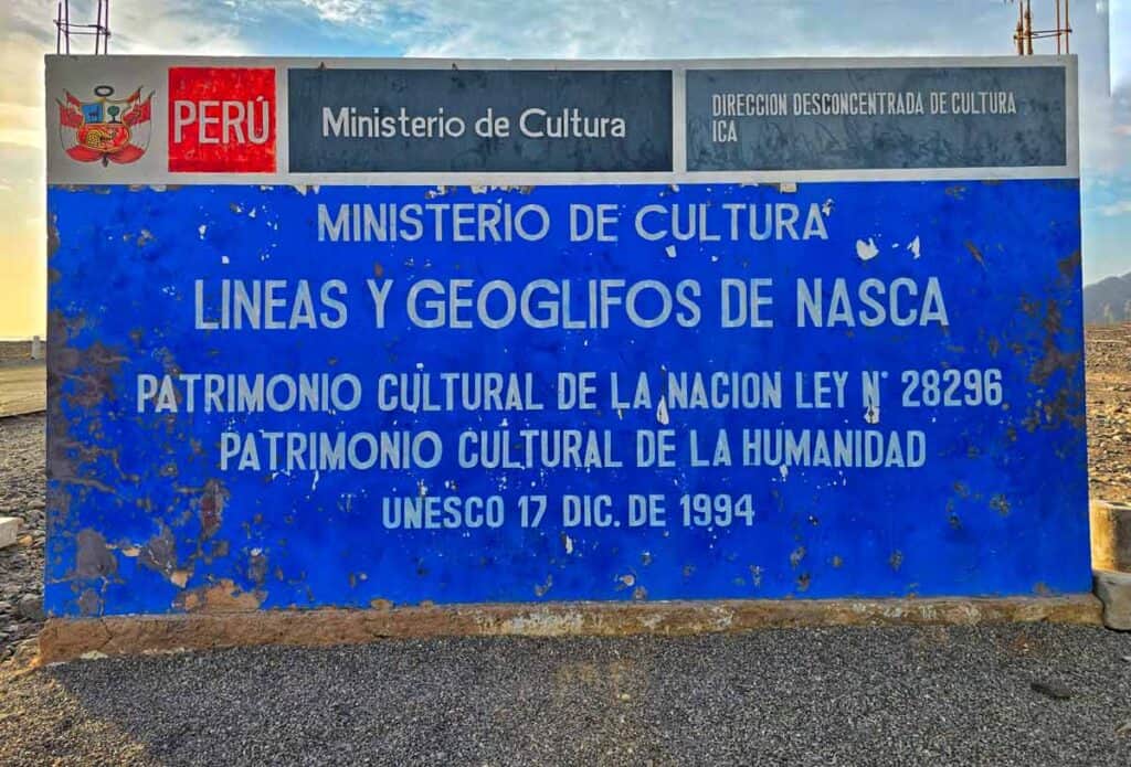 a simple blue sign announcing the UNESCO Nazca Lines