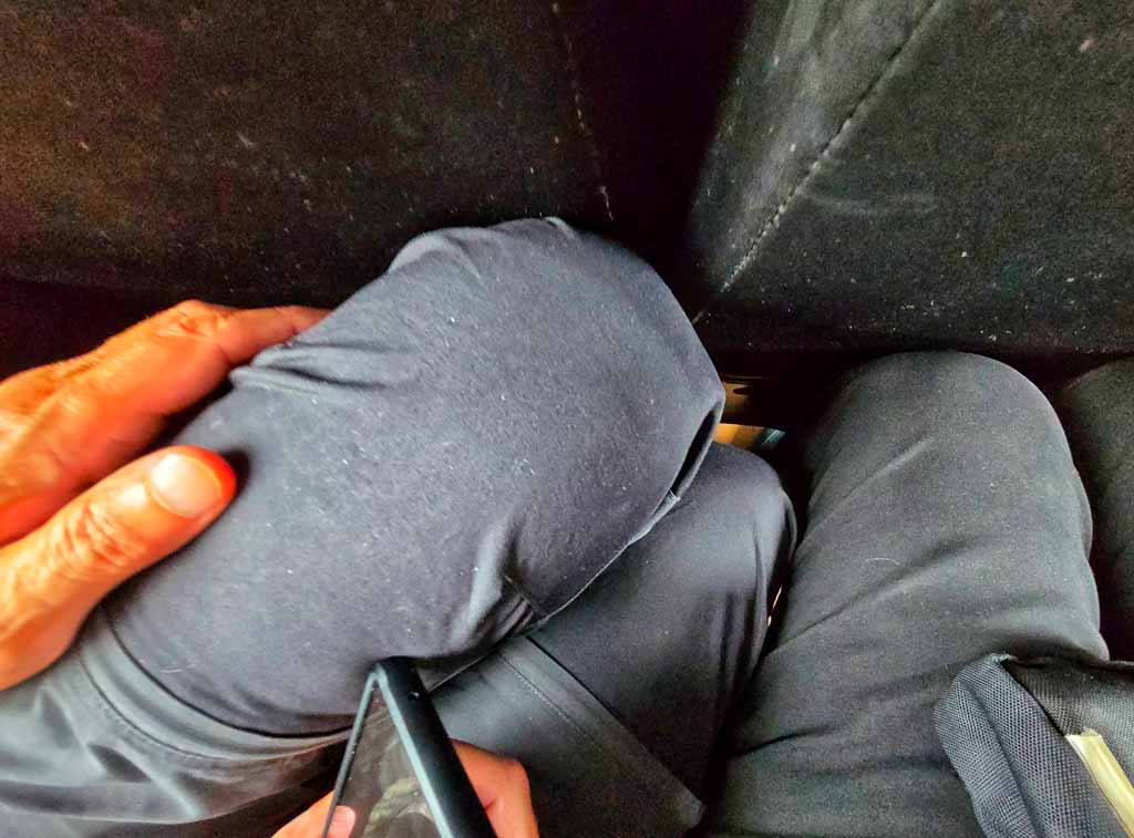 very tight squeeze for gerry's legs on our small bus