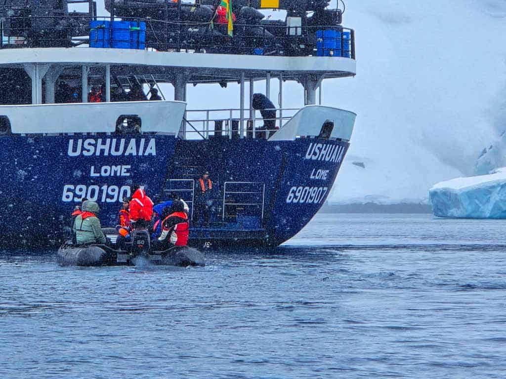 zodiac returning to our ship in a snow storm